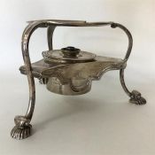 A Georgian silver kettle stand and burner with cre