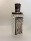 A good Continental silver mounted scent bottle wit