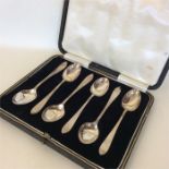 A boxed set of six silver coffee spoons. Sheffield