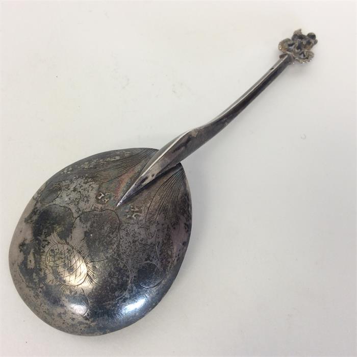 An early Continental spoon, the finial mounted wit - Image 2 of 2