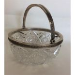 A Russian silver mounted bonbon dish with swing ha