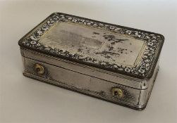 A rare Georgian silver music box, the border decor