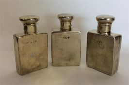 A good set of three silver gilt perfume bottles wi