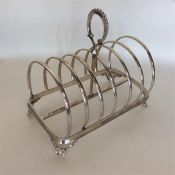 A heavy Victorian six-bar toast rack with scroll d