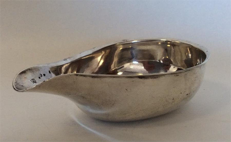 A Georgian silver pap boat with plain border and p