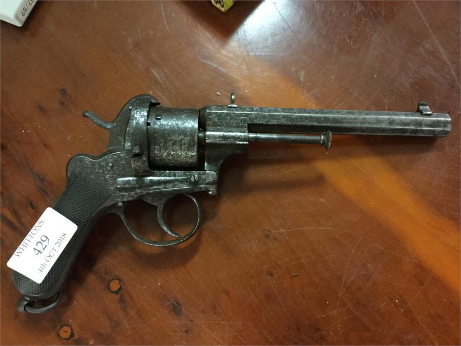 An Antique steel pistol with ring handle.