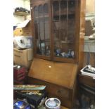 A mahogany glazed bureau bookcase.