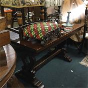 An oak refectory table together with matching chai