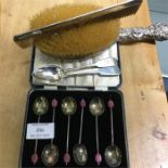 A boxed set of bean top spoons, silver hairbrush a