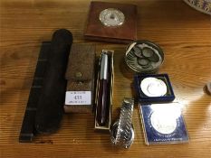 Silver mounted coins, a Parker pen etc.