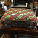 A Regency style foot stool.