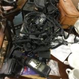 A large collection of old mobile telephones and le