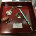 A silver mounted watch medallion, pencil etc.