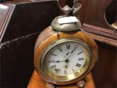 A stylish enamelled mantle clock.