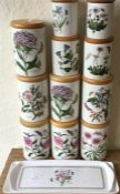 Eleven Portmeirion storage jars and covers.