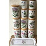 Eleven Portmeirion storage jars and covers.