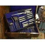 An oak cased cutlery service together with one oth