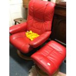 A modern leather reclining chair together with a m