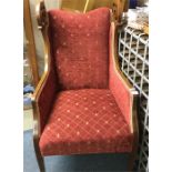 A red mahogany armchair.