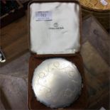A Chinese silver compact.