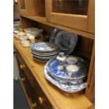 A quantity of blue and white plates together with