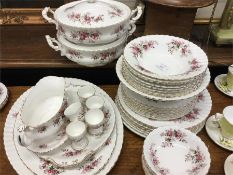 A large Royal Country Roses dinner service.