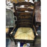 A good ladder back chair with cane seat.