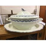 A large ironstone tureen and cover.