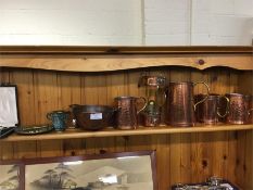 A collection of brass and copper wares.