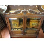 A good Edwardian oak smoker's cabinet.