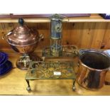 An old miner's lamp, brass trivets etc.