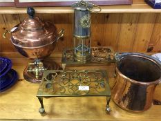 An old miner's lamp, brass trivets etc.