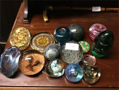 A quantity of good glass paperweights.