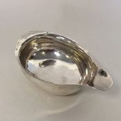 A good Georgian silver pap boat with bright cut de