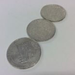 Three silver one dollar coins. Est. £30 - £40.