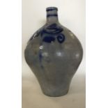 A large stoneware flagon decorated with blue groun