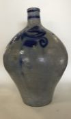 A large stoneware flagon decorated with blue groun