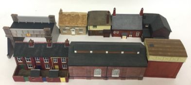 A box containing resin buildings, work sheds and b