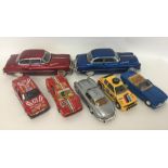 Seven various die-cast and other racing cars etc.