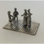A Continental miniature of dancers on silver cobbl
