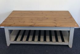 A large pine occasional table with plank top and s