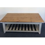 A large pine occasional table with plank top and s