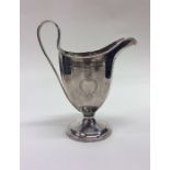 A massive Georgian bright cut silver cream jug dec