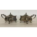 A pair of silver Adams' style mustards with hinged
