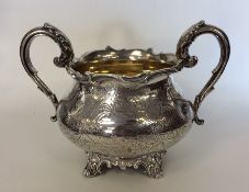 An attractive Victorian silver sugar bowl engraved