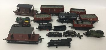 A box containing various N gauge and 00 gauge carr