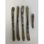 A set of five Antique tapering silver knives with