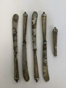 A set of five Antique tapering silver knives with