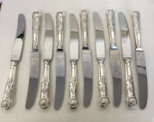 A set of ten kings' pattern knives with silver han