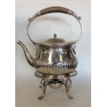 A good silver half fluted kettle on stand with hin
